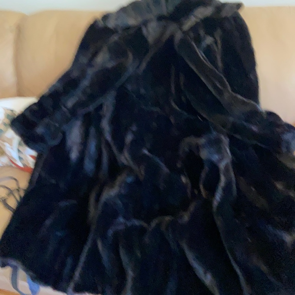 Fake fur in perfect condition with belt